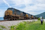 CSX 3228 leads a manifest along Lake Nickajack 